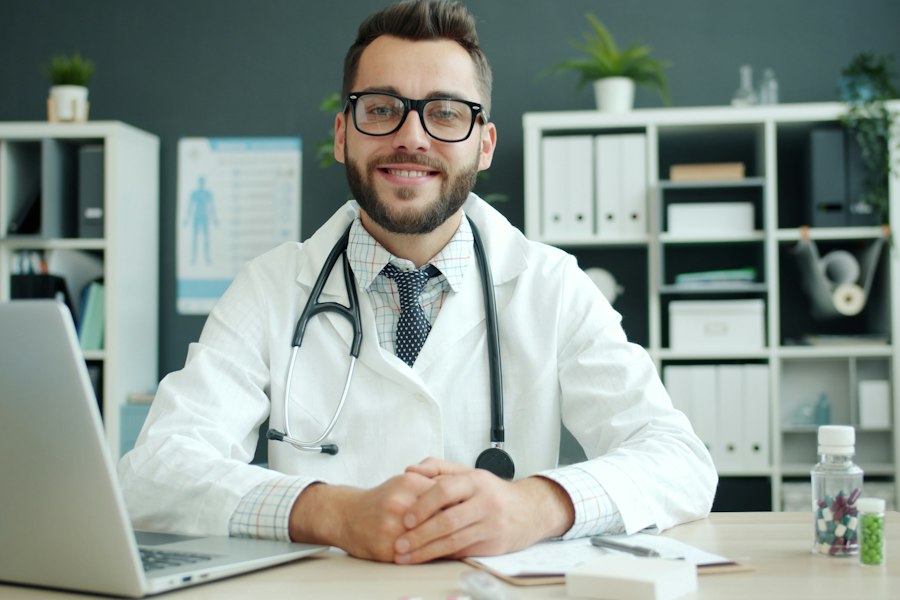 Smiling doctor at his desk in a medical office